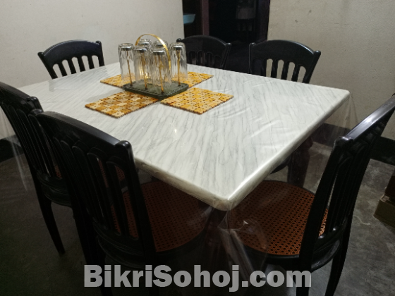 ছয় চেয়ারের ডাইনিং টেবিল